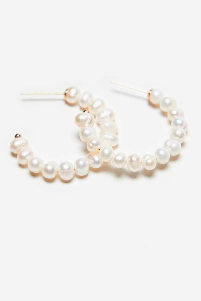 pendientes-perlas-navidad Cortefiel, 12,99€