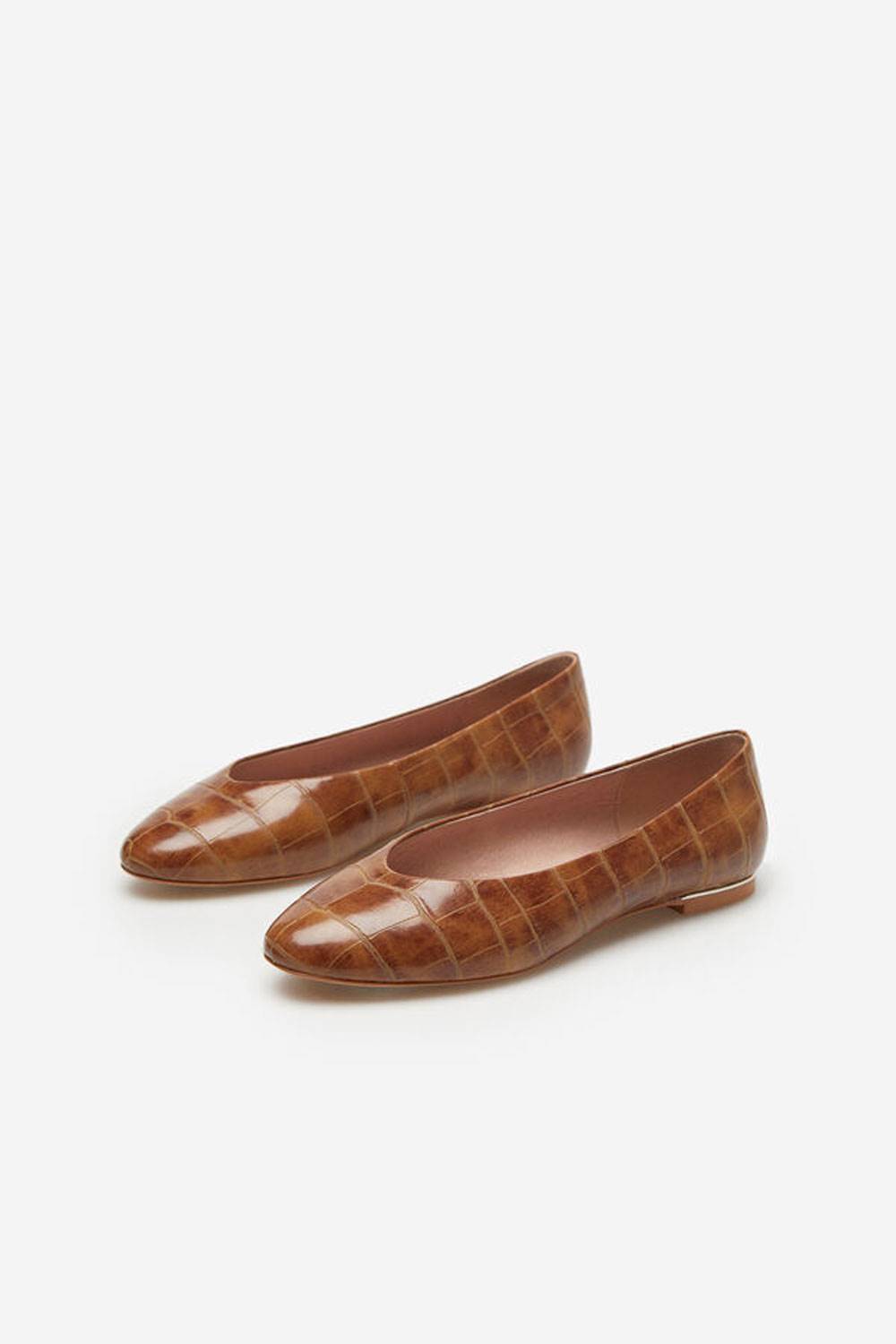 Zapatos Bailarina con grabado de cocodrilo de Cortefiel, 69,99€