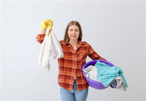 Cómo limpiar la grasa de la ropa
