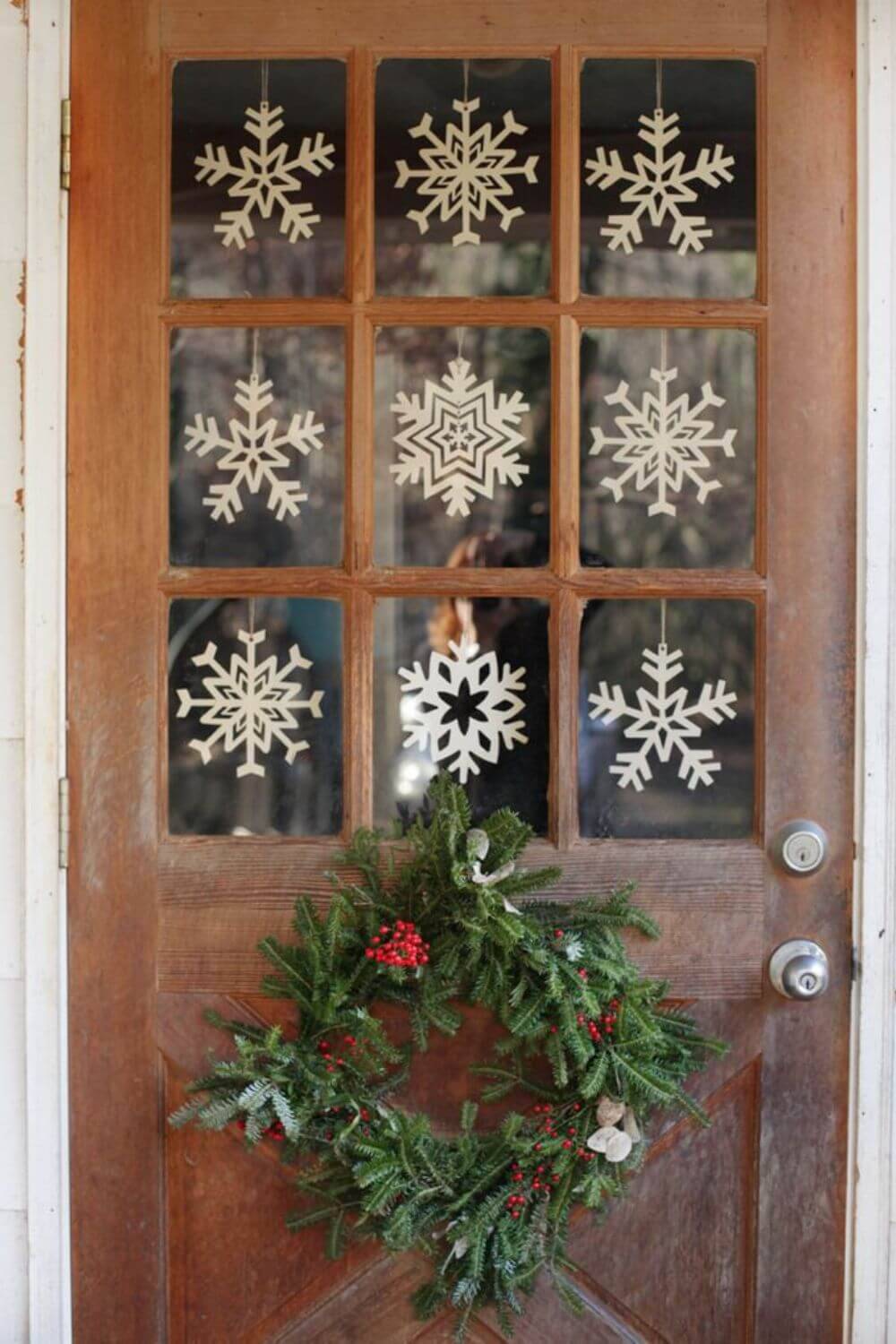 Decoraciones de Navidad para puertas con copos