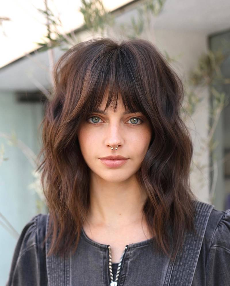 Shaggy women's haircuts: with blunt bangs